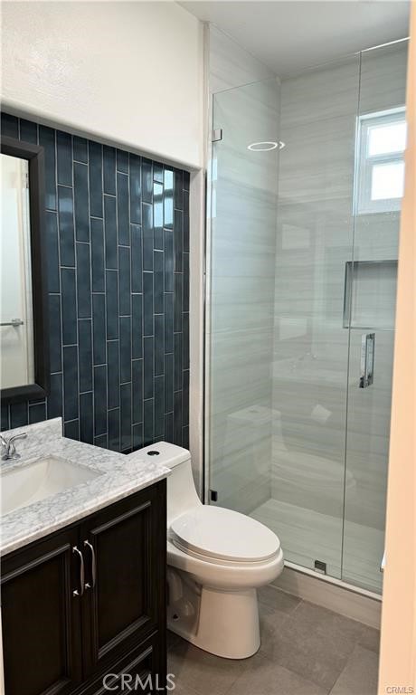 15 Marsala Irvine, CA 92606 - Photo 19 of 31 a bathroom with a sink a toilet and shower