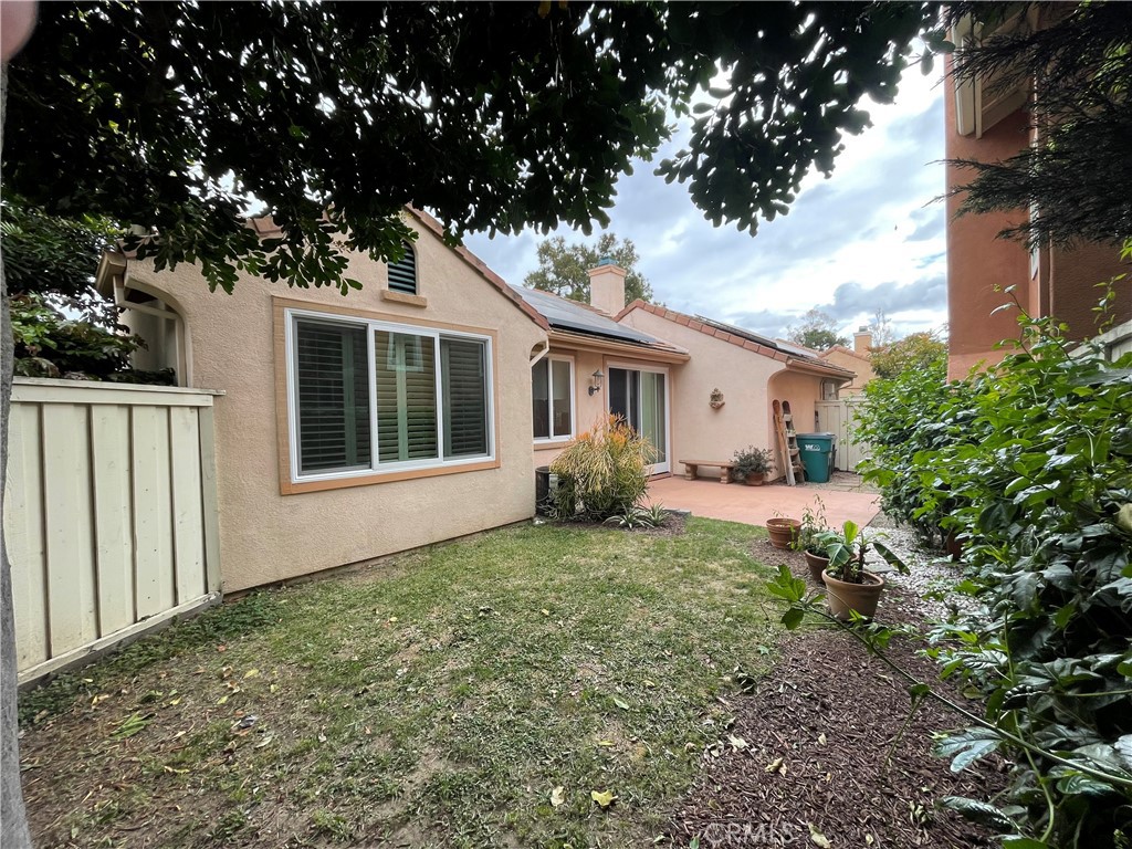 15 Marsala Irvine, CA 92606 - Photo 25 of 31 a front view of a house with a garden