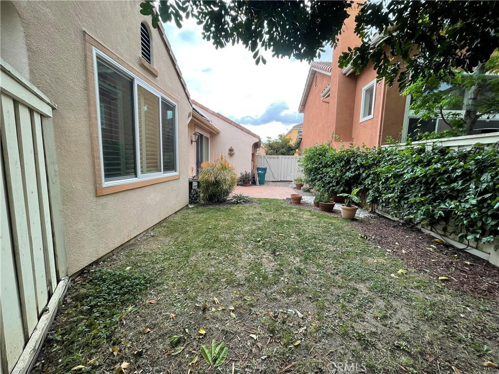 15 Marsala Irvine, CA 92606 - Photo 28 of 31 a house view with a garden space