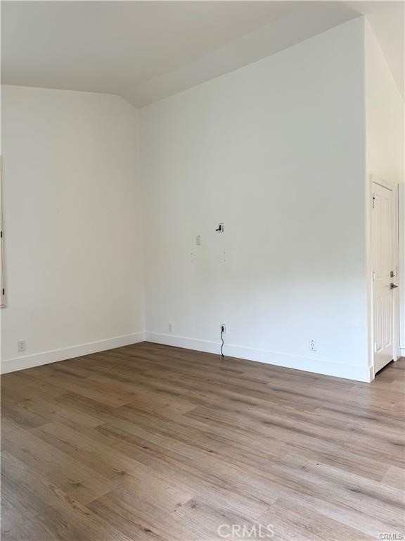 15 Marsala Irvine, CA 92606 - Photo 7 of 31 a view of an empty room with wooden floor