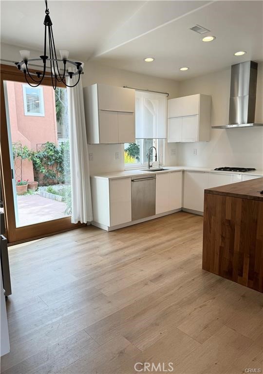 15 Marsala Irvine, CA 92606 - Photo 10 of 31 a kitchen with a wooden floor and a window