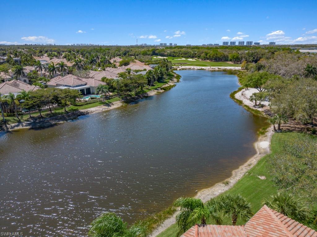 16985 Porta Vecchio Way, Unit 202 Naples, FL 34110 - Photo 23 of 50 an aerial view of a houses with outdoor space