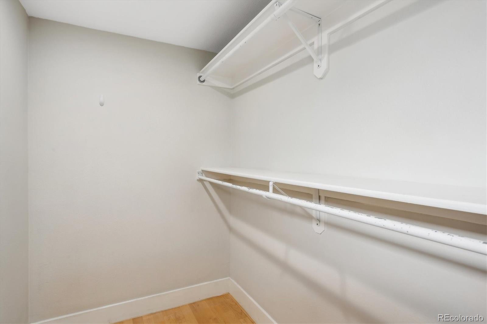 350 Detroit Street, Unit 413 Denver, CO 80206 - Photo 18 of 24 a view of small space with racks on the wall