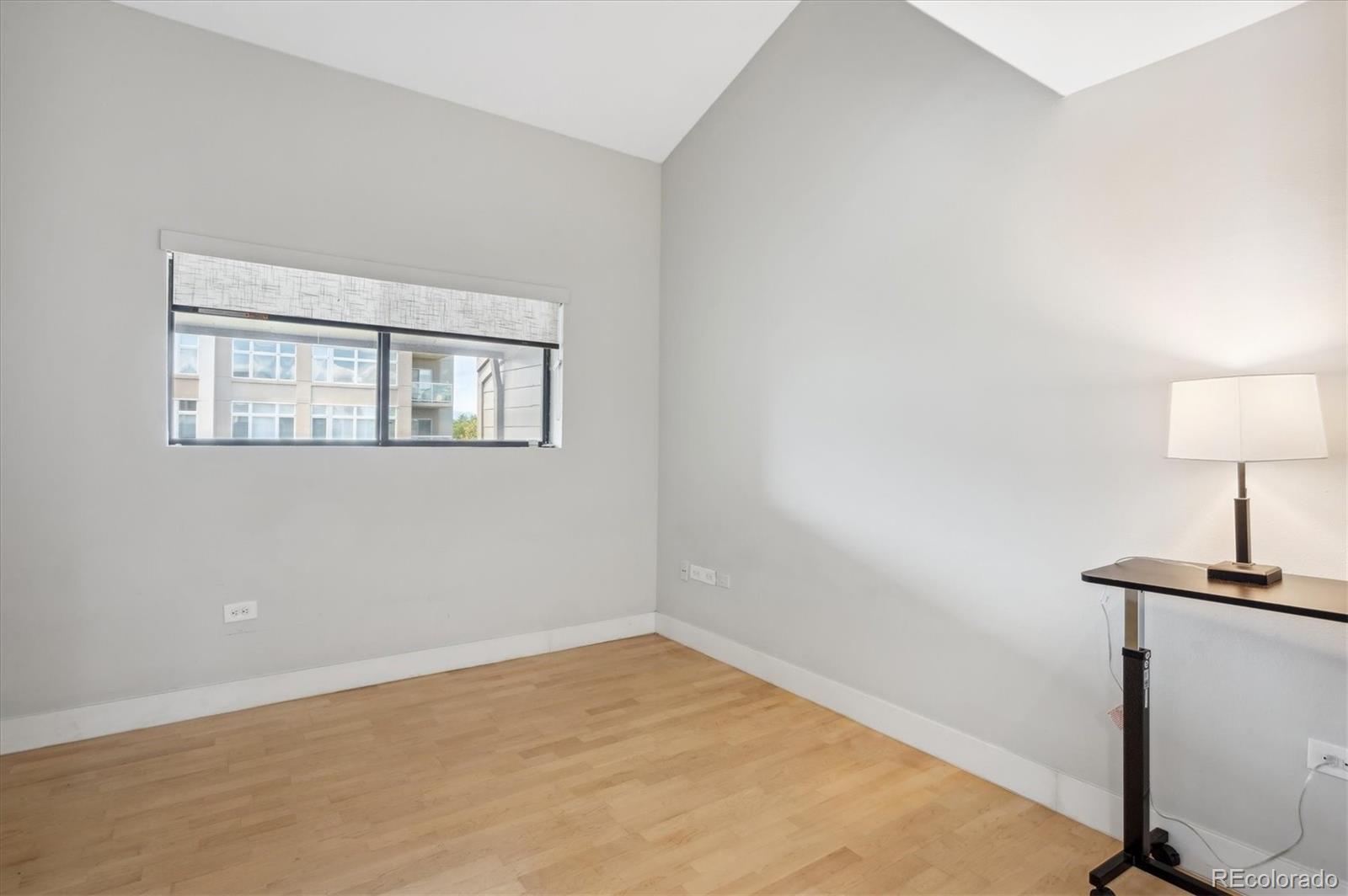 350 Detroit Street, Unit 413 Denver, CO 80206 - Photo 19 of 24 a view of an empty room with a window