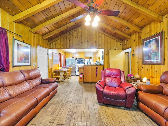 a view of a chairs and table in a patio