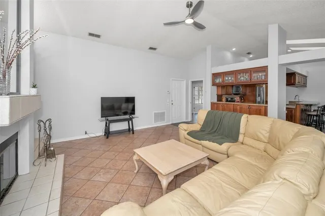 a living room with furniture and a couch