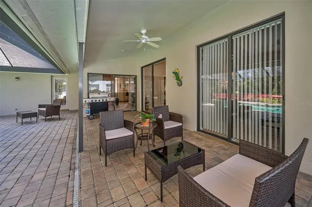 a living room filled with furniture and a garden
