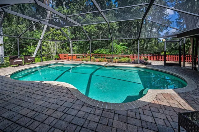 a view of a pathway with a small yard