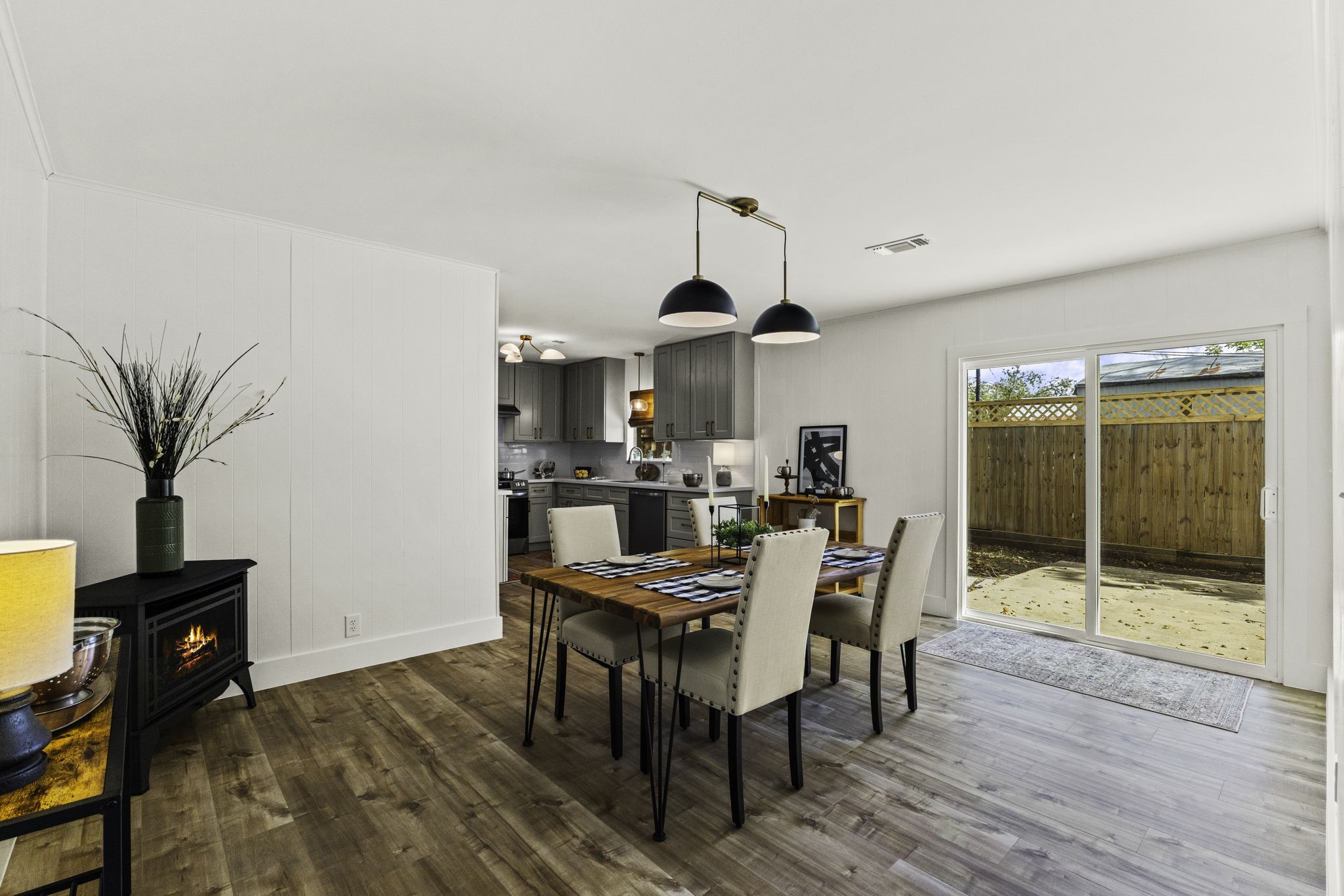 703 Austin Street Columbus, TX 78934 - Photo 19 of 37 a view of a dining room with furniture and wooden floor