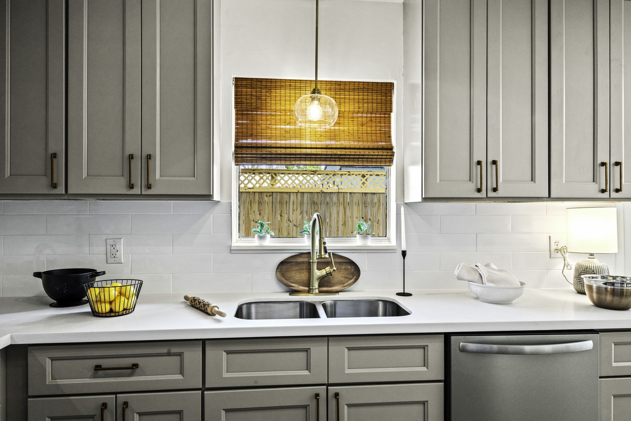 703 Austin Street Columbus, TX 78934 - Photo 23 of 37 a kitchen with a sink cabinets and window