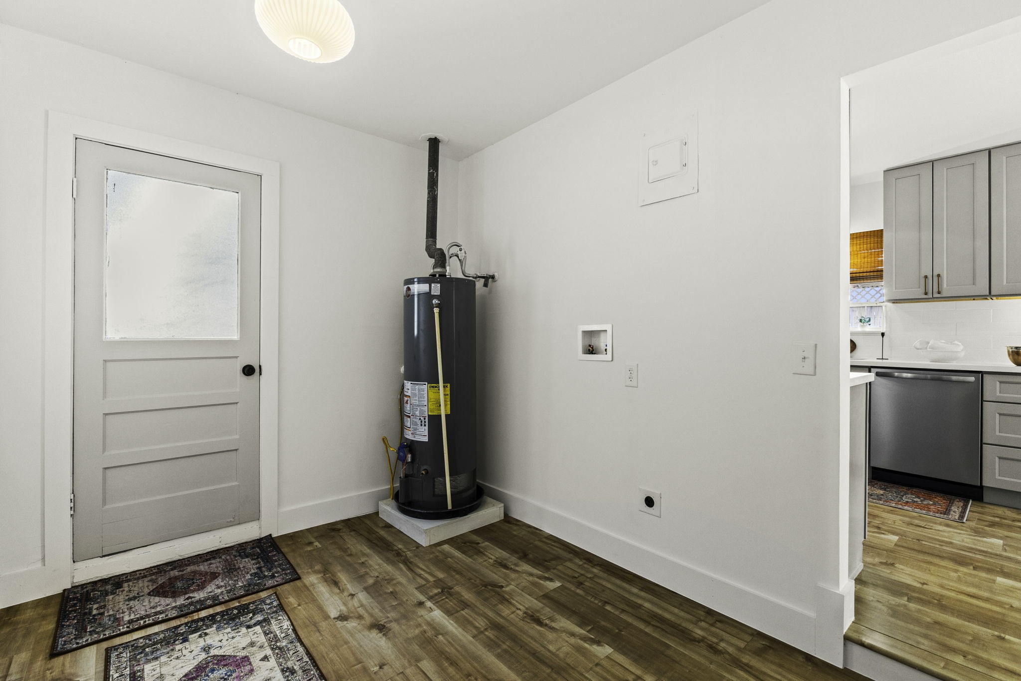 703 Austin Street Columbus, TX 78934 - Photo 25 of 37 a view of empty room with wooden floor