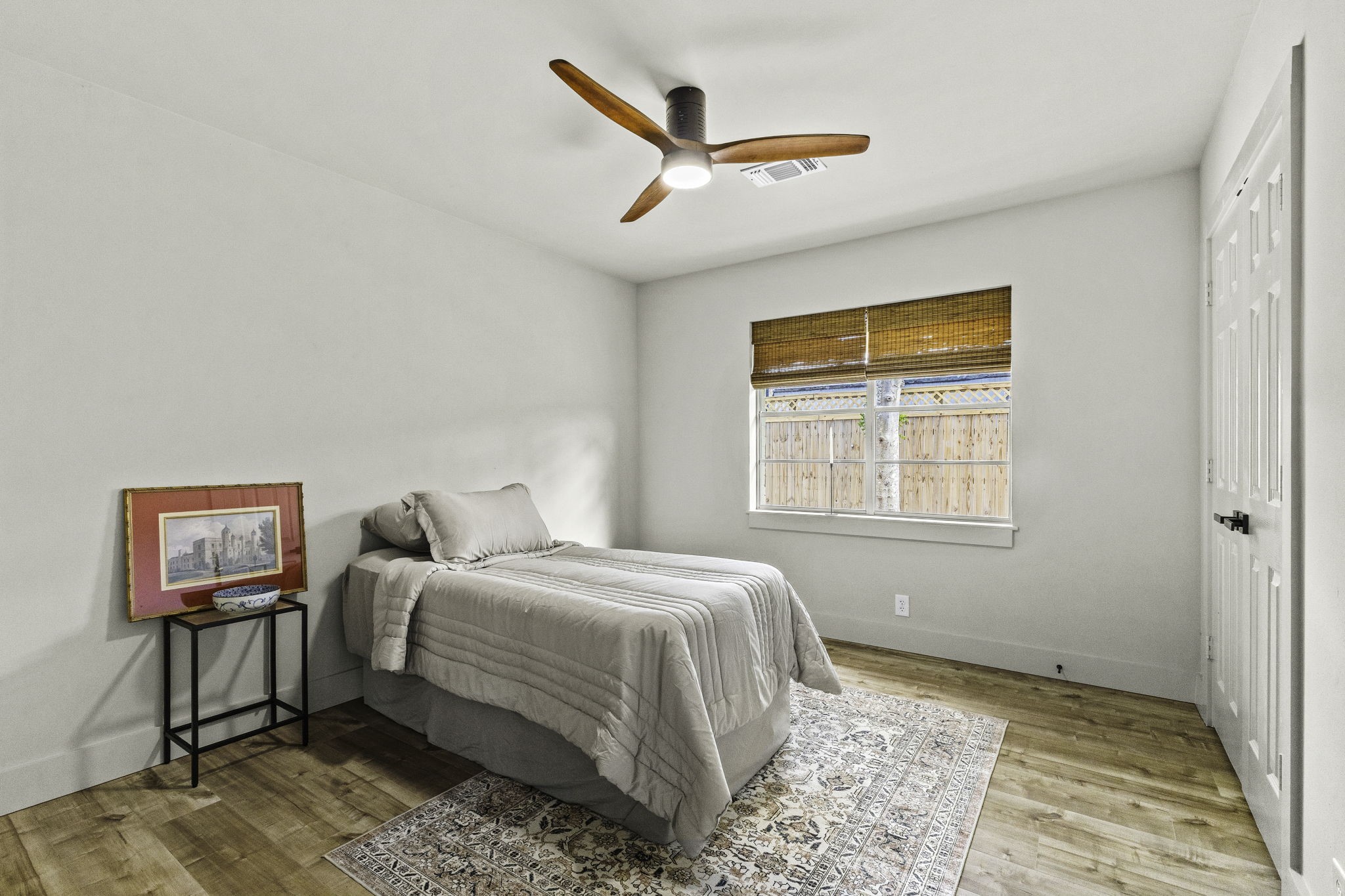 703 Austin Street Columbus, TX 78934 - Photo 26 of 37 a bedroom with a bed and a window