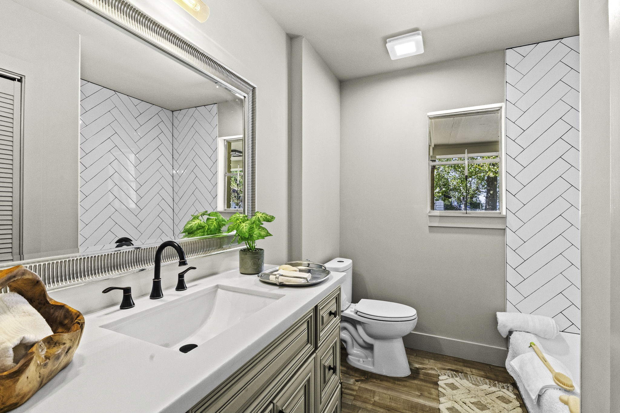703 Austin Street Columbus, TX 78934 - Photo 27 of 37 a bathroom with a sink toilet and tub
