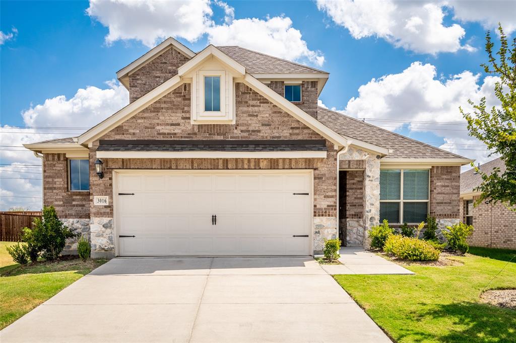 3016 Prairie Trail Avenue Aubrey, TX 76227 - Photo 1 of 1 a front view of a house with a yard
