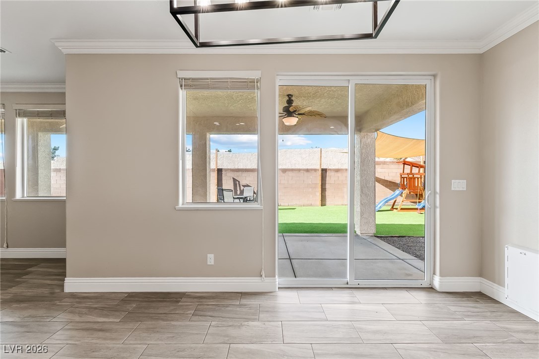 3807 Chapels Royal Street Laughlin, NV 89029 - Photo 16 of 62 Doorway featuring ornamental molding and healthy amount of natural light