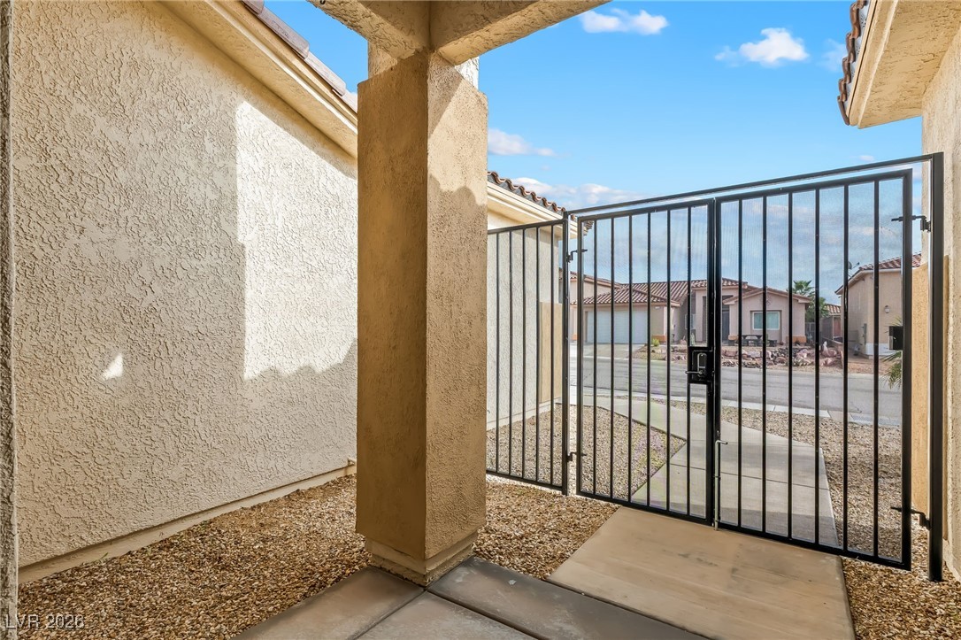 3807 Chapels Royal Street Laughlin, NV 89029 - Photo 2 of 62 Gated entry to the home, this photo was taken from the front door facing the street