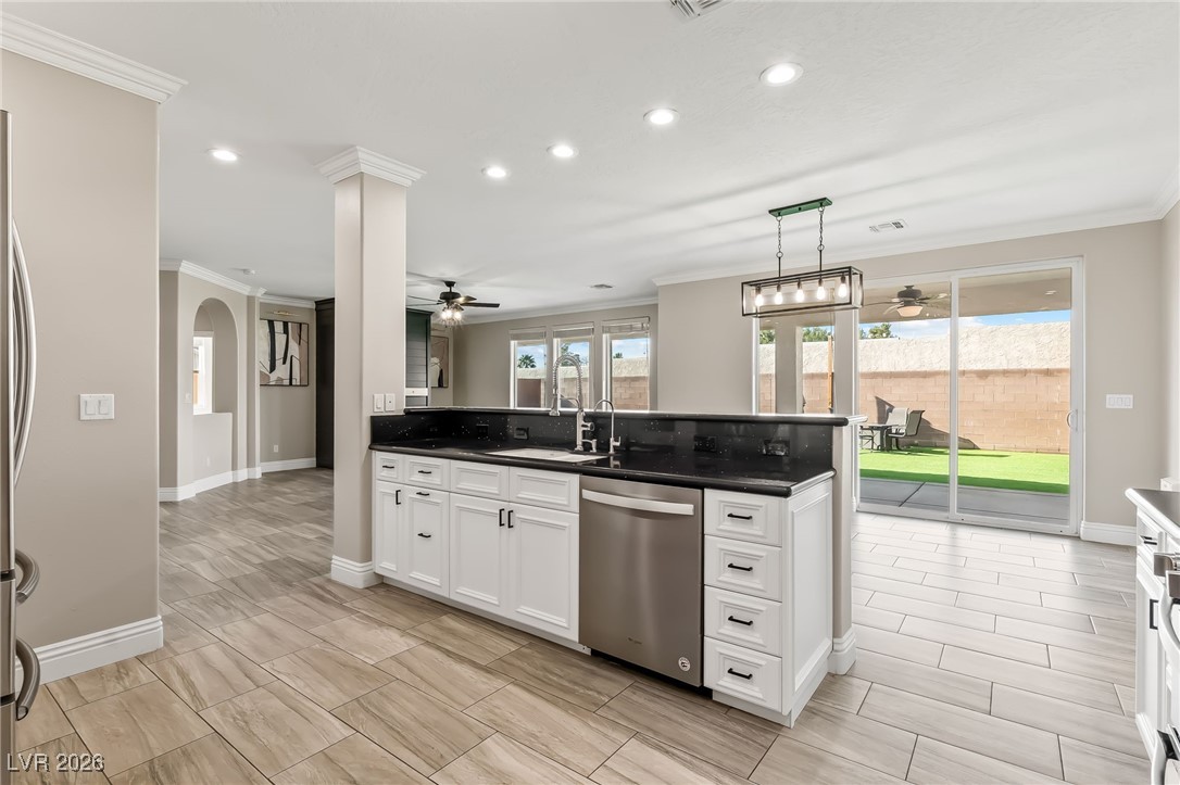 3807 Chapels Royal Street Laughlin, NV 89029 - Photo 21 of 62 Kitchen featuring white cabinets, pendant lighting, stainless steel appliances, recessed lighting, and ceiling fan