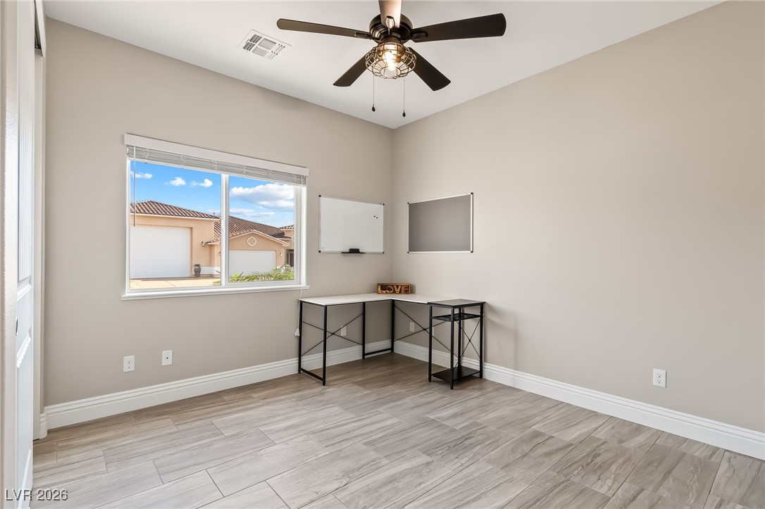 3807 Chapels Royal Street Laughlin, NV 89029 - Photo 28 of 62 Second bedroom featuring a closet and a ceiling fan