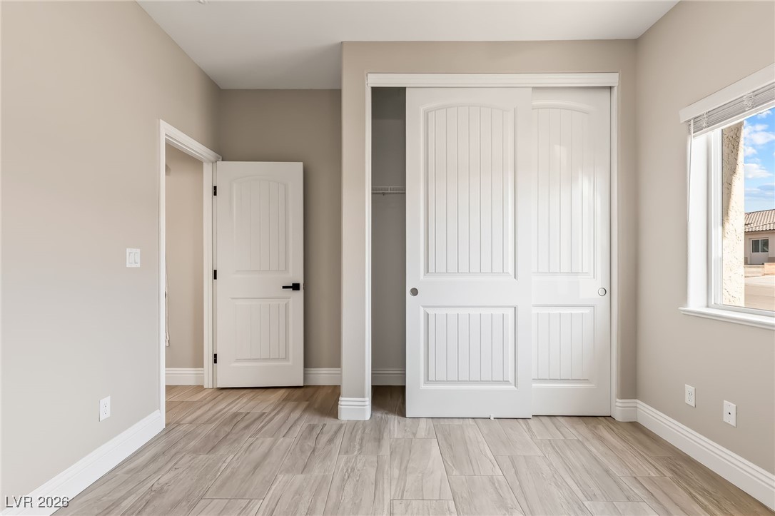3807 Chapels Royal Street Laughlin, NV 89029 - Photo 29 of 62 Second bedroom featuring a closet and baseboards