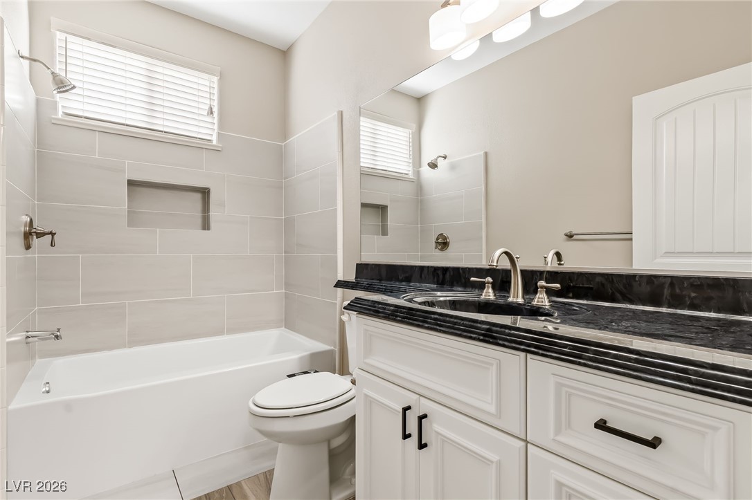 3807 Chapels Royal Street Laughlin, NV 89029 - Photo 31 of 62 Full Hall Bathroom featuring vanity and shower / washtub combination