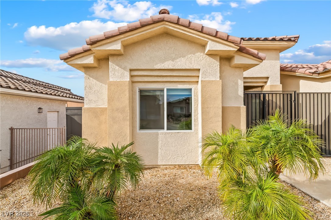 3807 Chapels Royal Street Laughlin, NV 89029 - Photo 51 of 62 View of home's exterior featuring stucco siding and a tile roof