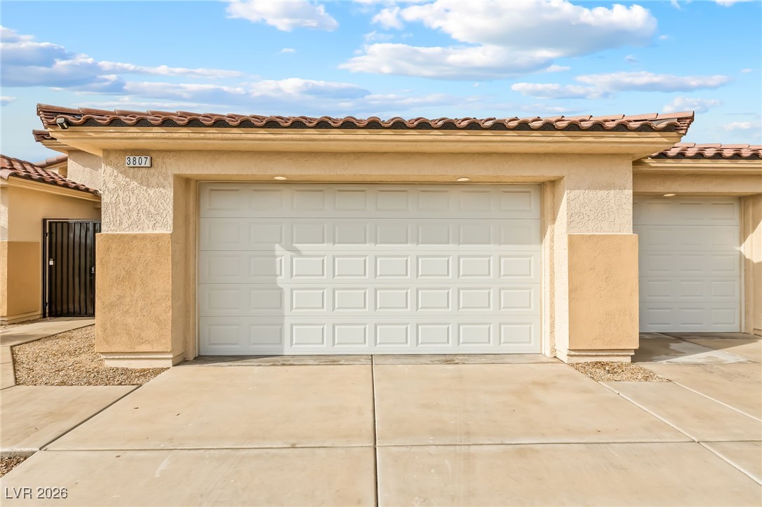 3807 Chapels Royal Street Laughlin, NV 89029 - Photo 53 of 62 Garage featuring driveway
