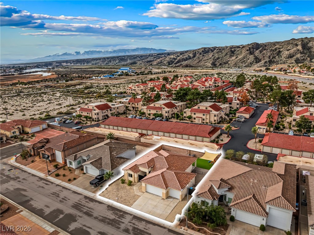3807 Chapels Royal Street Laughlin, NV 89029 - Photo 57 of 62 Aerial view of residential area with a mountainous background