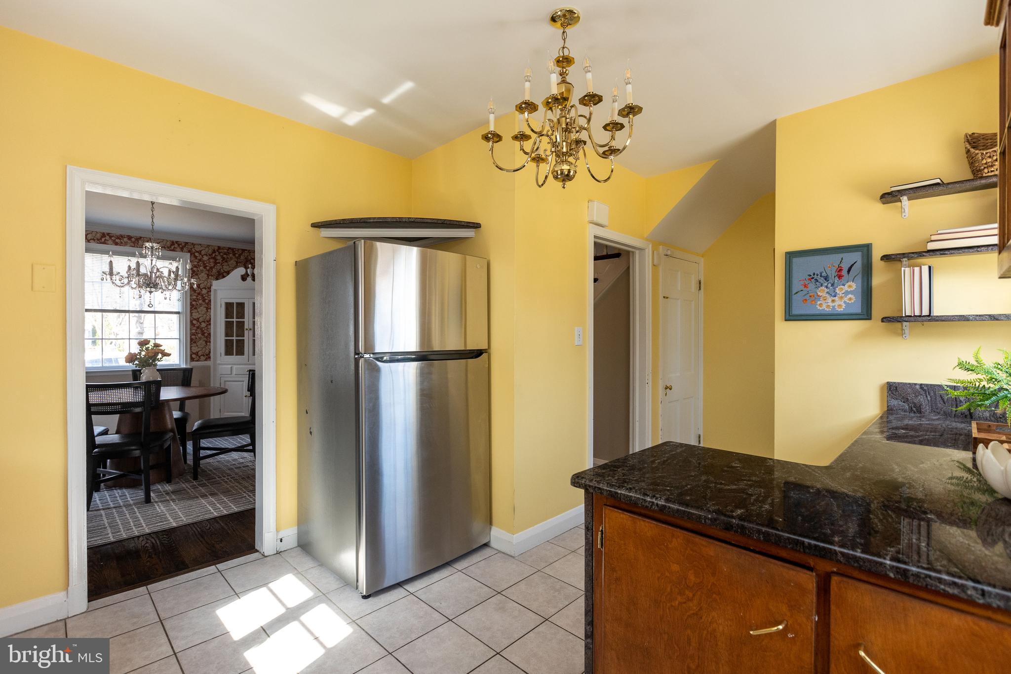 331 Broxton Road Baltimore, MD 21212 - Photo 11 of 58 a kitchen with a refrigerator and a counter top space