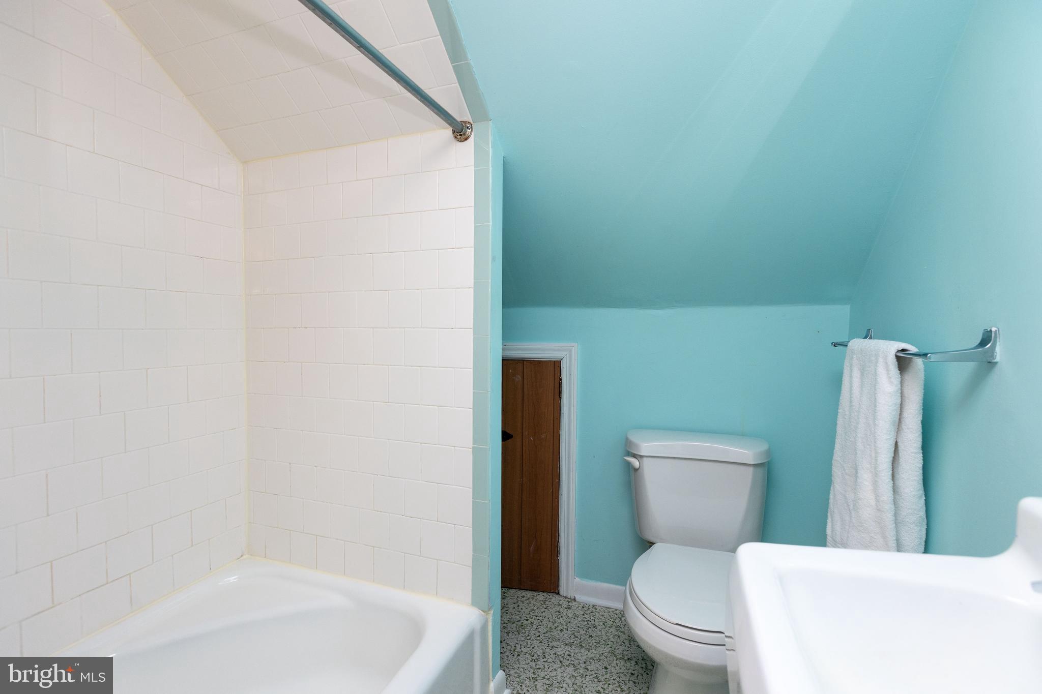 331 Broxton Road Baltimore, MD 21212 - Photo 27 of 58 a white toilet sitting next to a bath tub