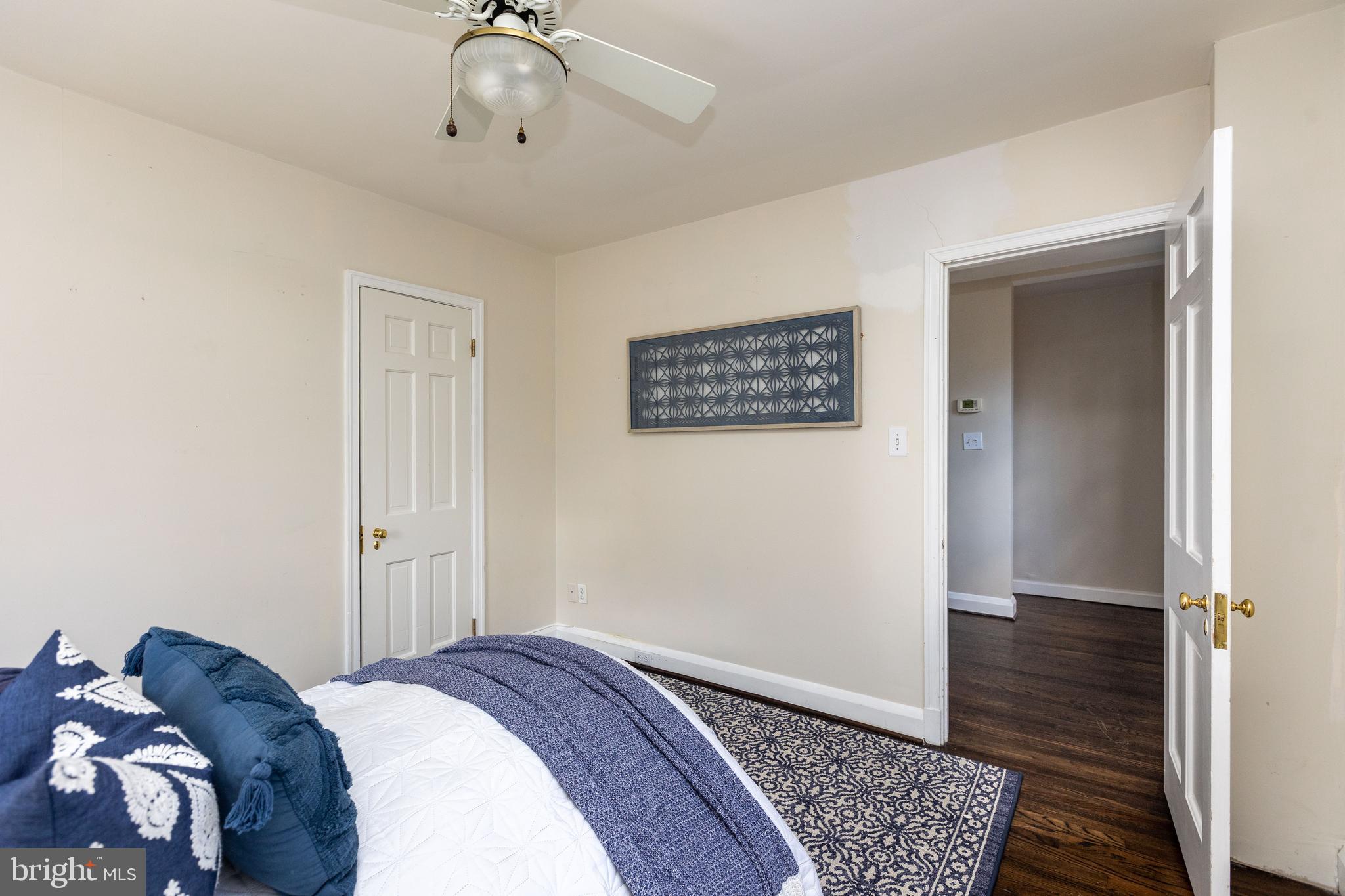 331 Broxton Road Baltimore, MD 21212 - Photo 30 of 58 a bedroom with a bed and a walk in closet