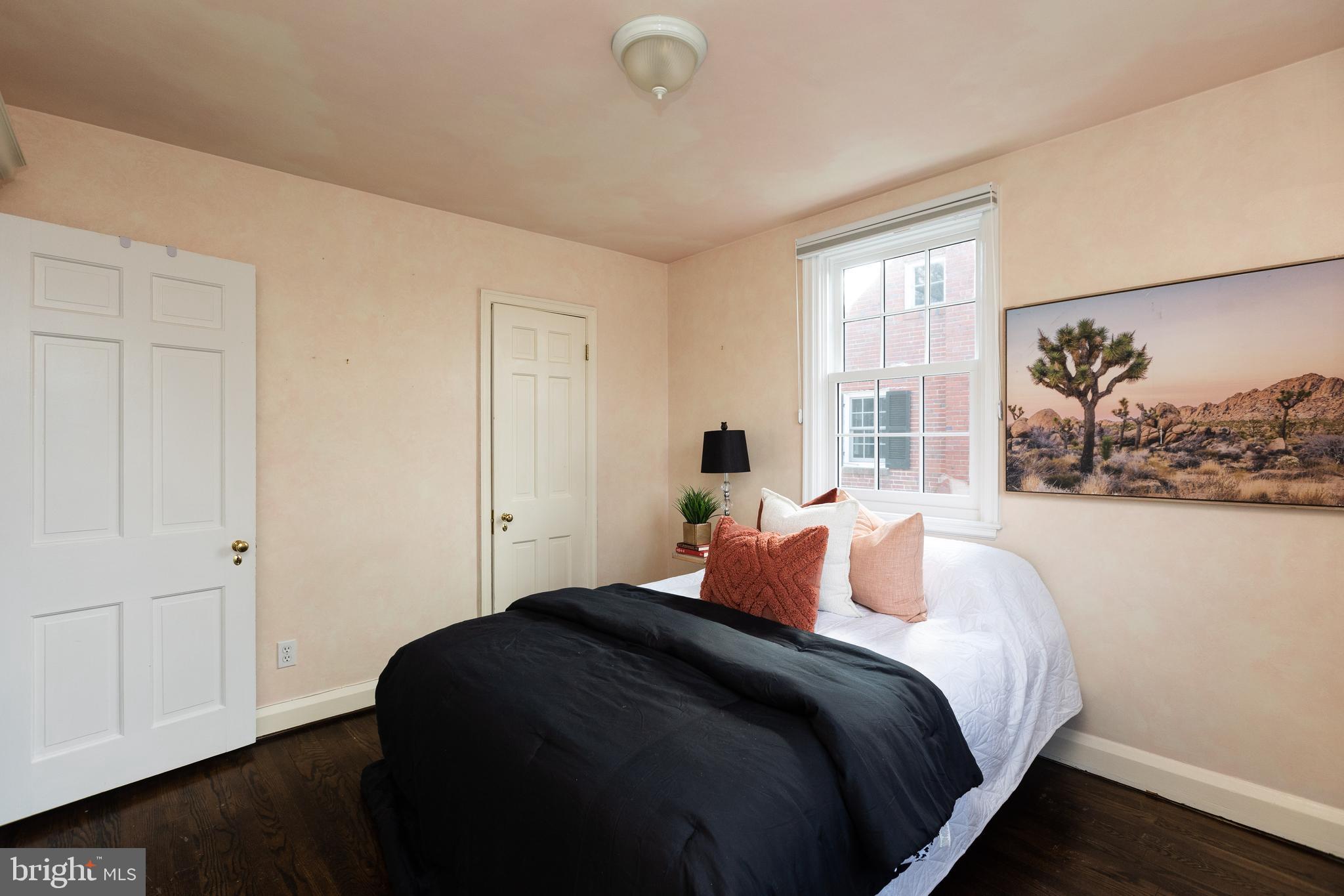 331 Broxton Road Baltimore, MD 21212 - Photo 36 of 58 a bedroom with a bed and window