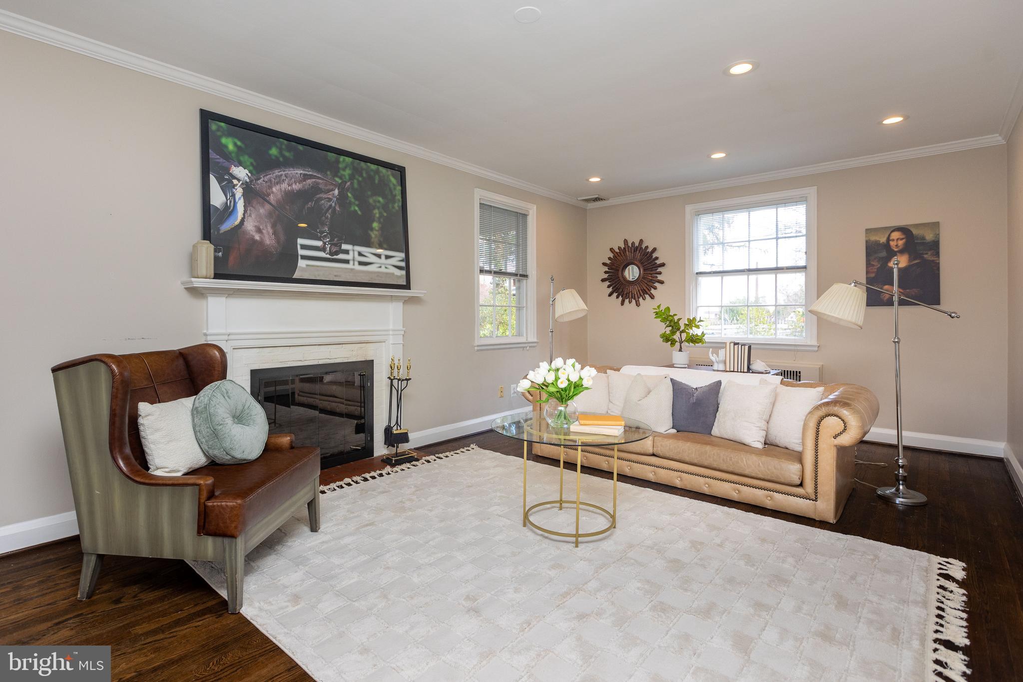 331 Broxton Road Baltimore, MD 21212 - Photo 4 of 58 a living room with furniture and a fireplace