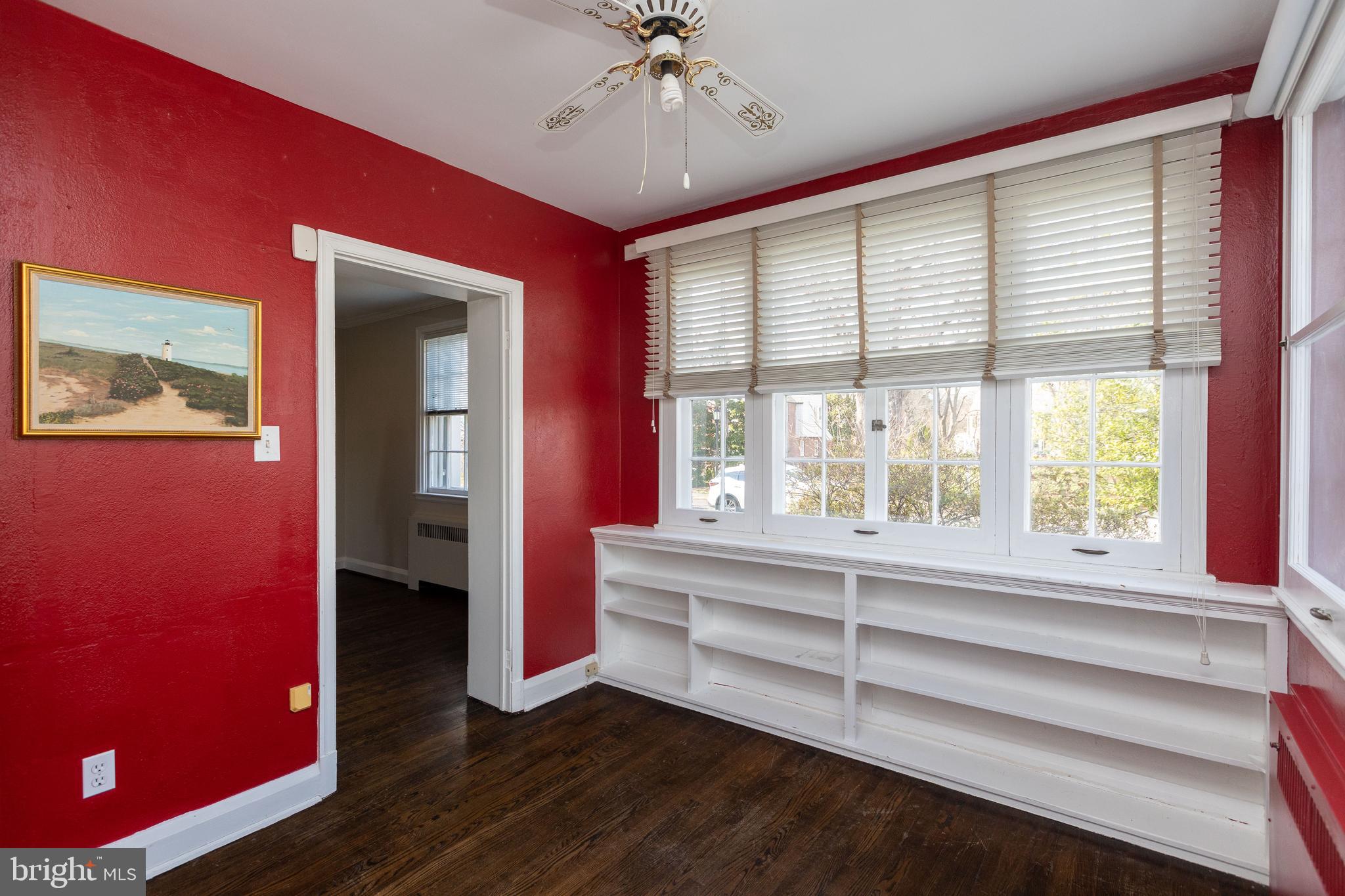 331 Broxton Road Baltimore, MD 21212 - Photo 7 of 58 a view of room with window and a ceiling fan