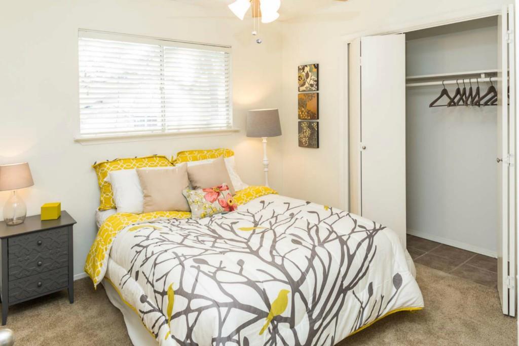 3405 Helms Street, Unit 206 Austin, TX 78705 - Photo 5 of 6 a bedroom with a bed and window