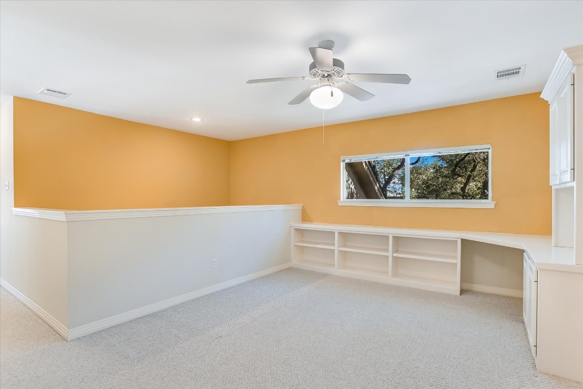 4819 Spicewood Springs Road Austin, TX 78759 - Photo 12 of 20 a view of an empty room with a window