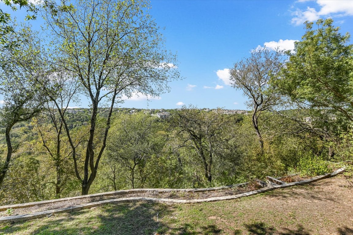 4819 Spicewood Springs Road Austin, TX 78759 - Photo 18 of 20 a view of a yard