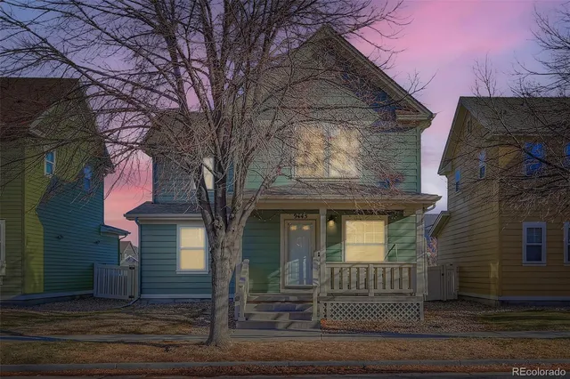 front view of a house with a small yard