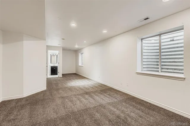 a view of empty room with a window