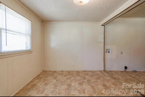 a view of a room with a window