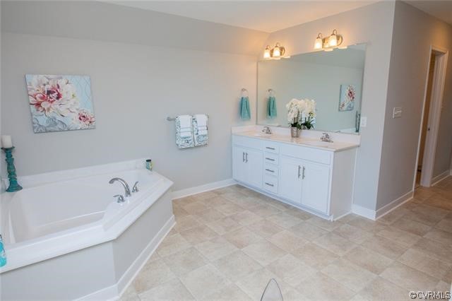 Lot 2 Corte Castle Road Chesterfield, VA 23838 - Photo 17 of 37 a bathroom with a bathtub sink and a mirror