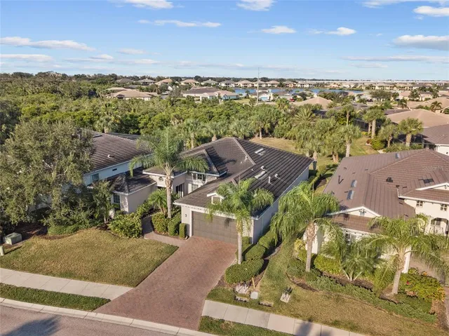 an aerial view of a house with a garden