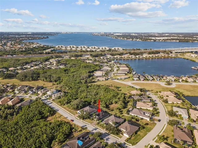 an aerial view of residential building and lake view