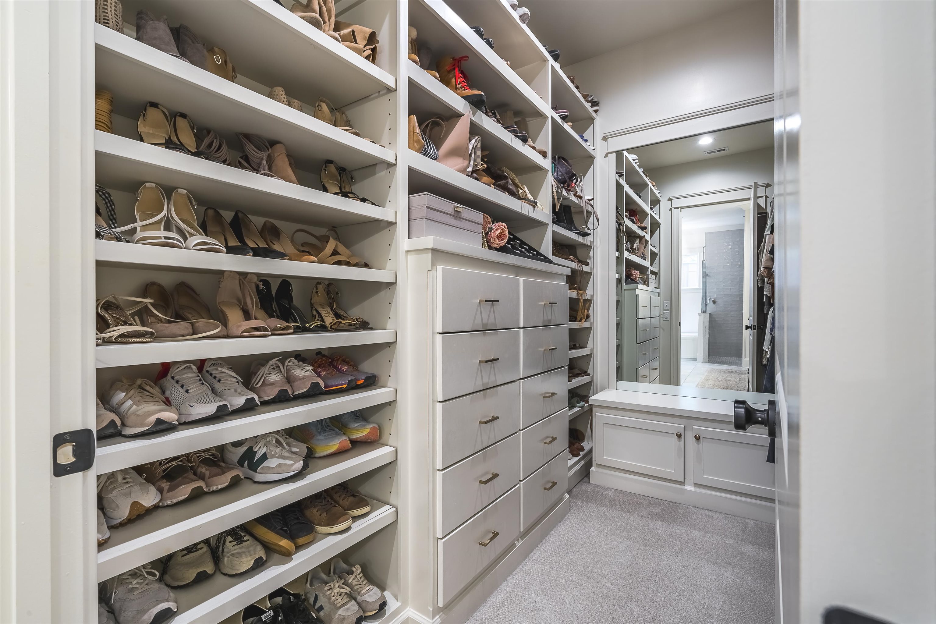 4764 Barfield Road Memphis, TN 38117 - Photo 13 of 25 a view of walk in closet with clothes and shoes