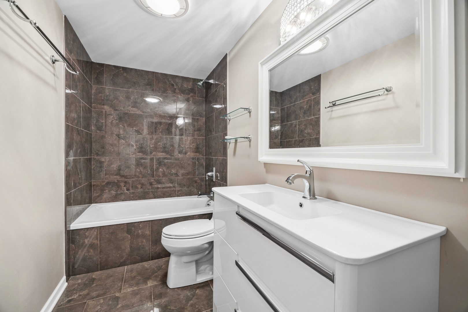 4103 Wisconsin Avenue Stickney, IL 60402 - Photo 17 of 24 a bathroom with a sink a toilet and shower
