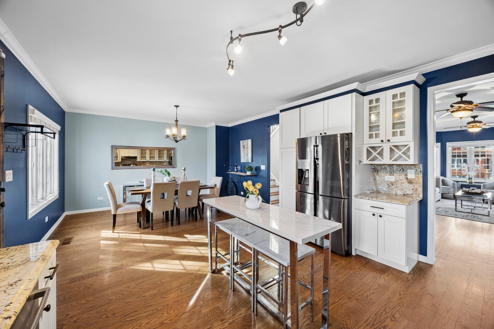 4103 Wisconsin Avenue Stickney, IL 60402 - Photo 5 of 24 a living room with stainless steel appliances kitchen island granite countertop furniture and a kitchen view