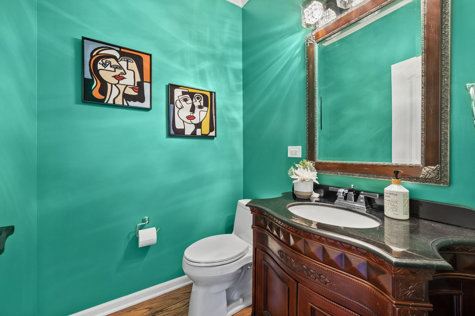 4103 Wisconsin Avenue Stickney, IL 60402 - Photo 7 of 24 a bathroom with a toilet sink and mirror