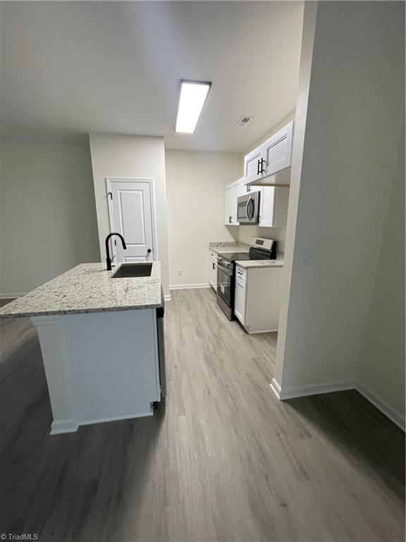 1015 Sharon Street High Point, NC 27260 - Photo 19 of 24 Open design for eat-in kitchen or extended living room