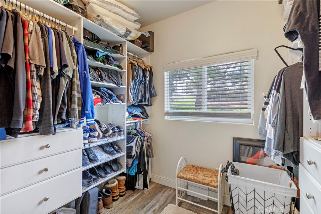 28841 Delaware Drive Tehachapi, CA 93561 - Photo 21 of 36 a view of walk in closet with clothes and shoes