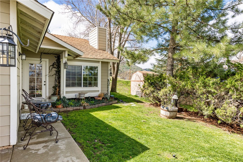28841 Delaware Drive Tehachapi, CA 93561 - Photo 28 of 36 a view of house with backyard