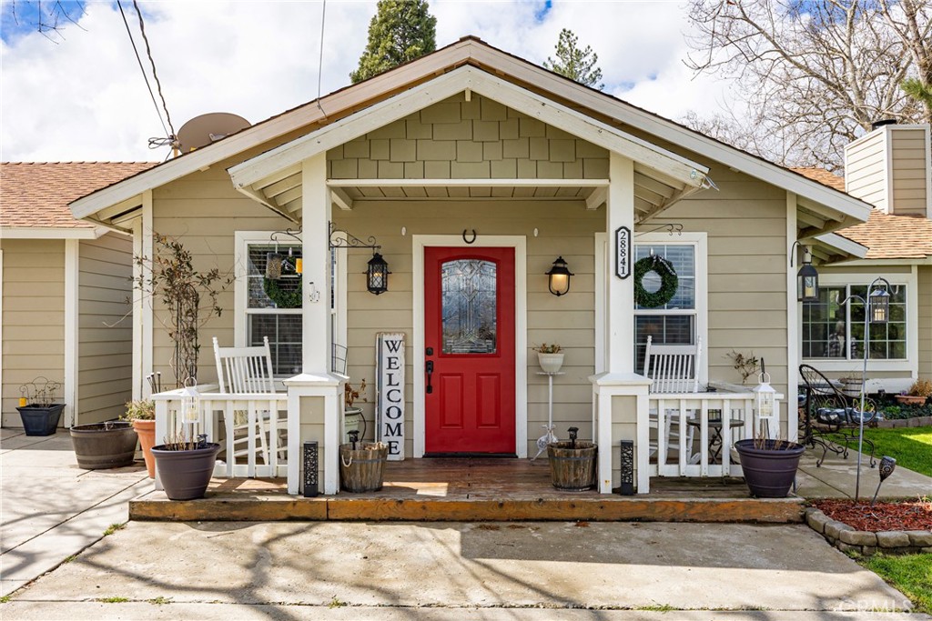 28841 Delaware Drive Tehachapi, CA 93561 - Photo 2 of 36 a front view of a house with a yard
